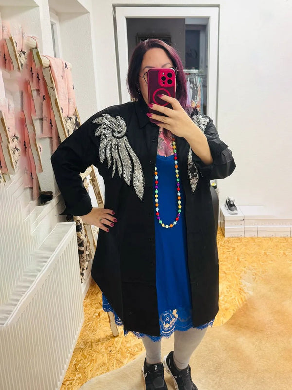 Engelsflügel Bluse – in großen Größen von CurvyRausch. Stylische Plus Size Fashion für kurvige Frauen.