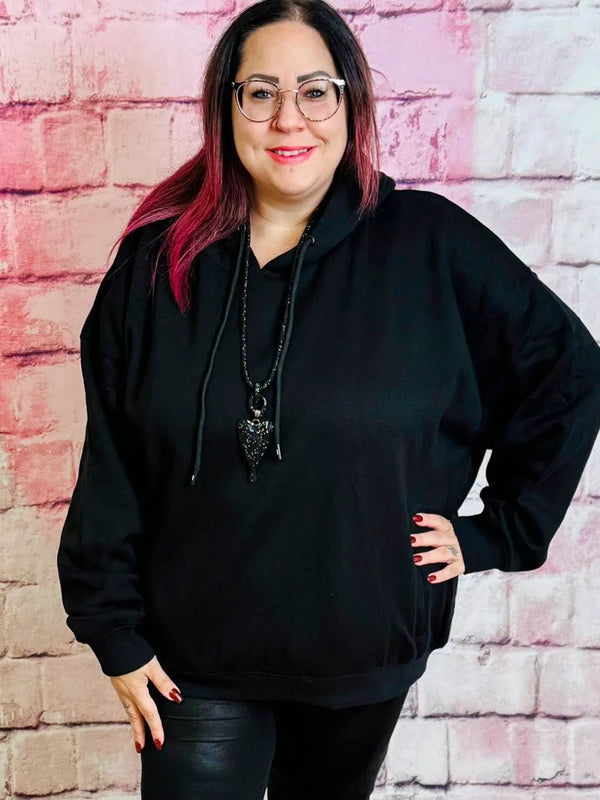 Kuscheliger Oversize Hoodie mit Butterfly Rückenprint – in großen Größen von CurvyRausch. Stylische Plus Size Fashion für kurvige Frauen.